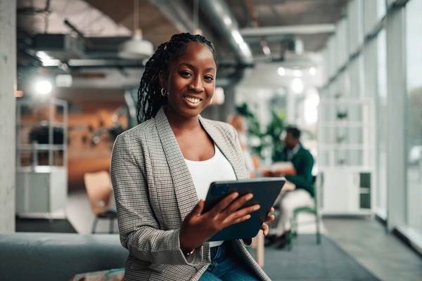 young black businesswoman smiling camera 600nw 2714024757 young black businesswoman smiling camera 600nw 2714024757